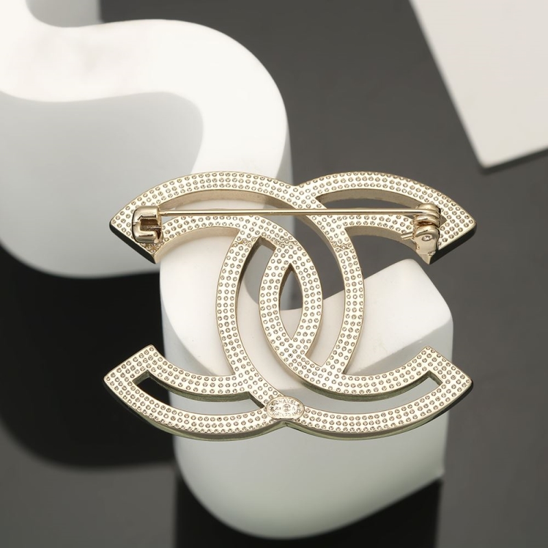 Ch**el brooches